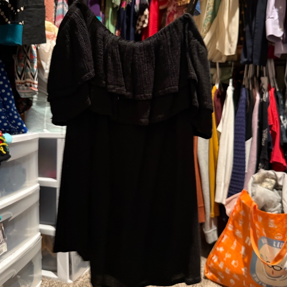 Kids off the shoulder top. Worn a few times. In good condition